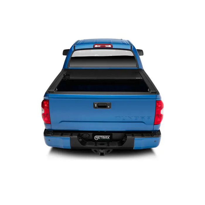 RetraxONE XR bed cover for Tacoma with Trax Rail - blue truck rear view