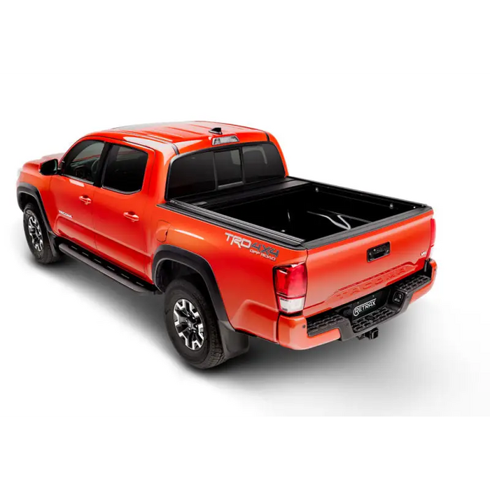 Red truck with black bed cover - RetraxPRO MX for 16-18 Tacoma.