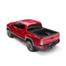 Red truck with black hood and RetraxPRO XR trax rail cargo capacity for 16-18 Tacoma Double Cab.