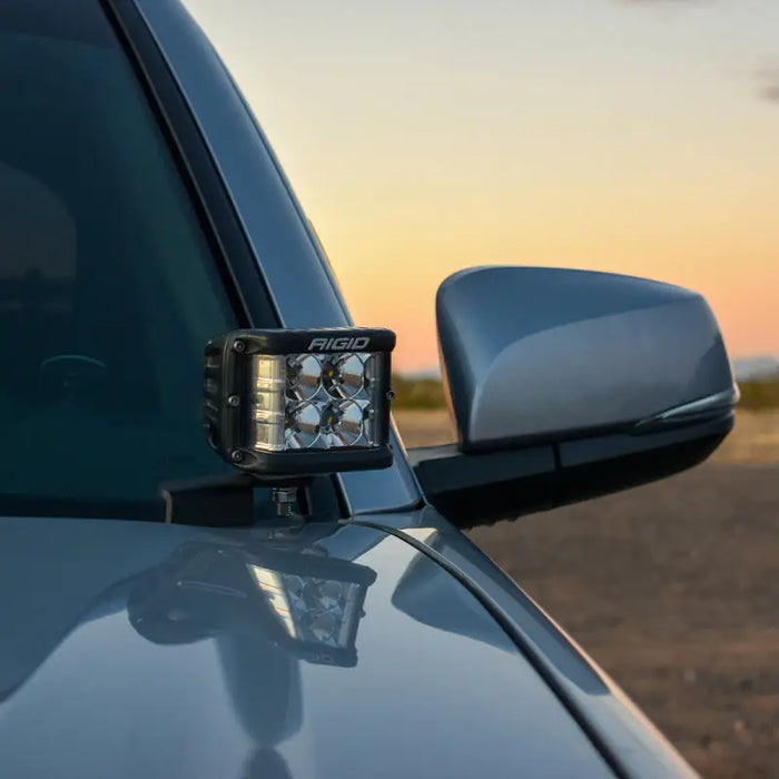 Side view mirror on Toyota Tacoma with Rigid Industries A-Pillar Light Mount Kit.