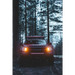 Rigid Industries 20in Adapt Light Bar with LED light bars in woods.