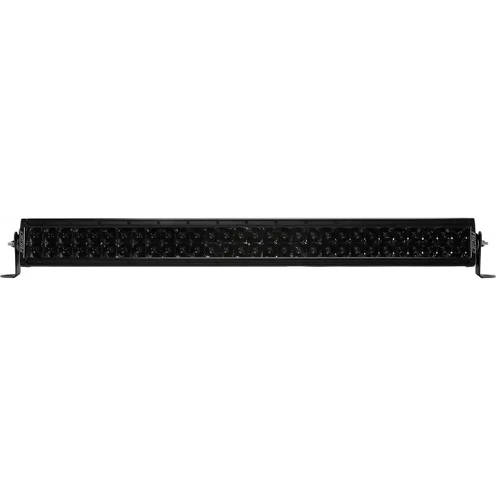 Rigid Industries 30in E Series Spot - Midnight Edition LED light bar with midnight optics on white and black backgrounds.