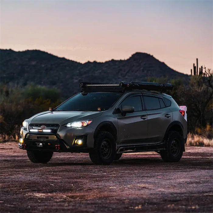 Rigid Industries 360-Series SAE Fog Yellow/White Pair SUV parked in field with mountains