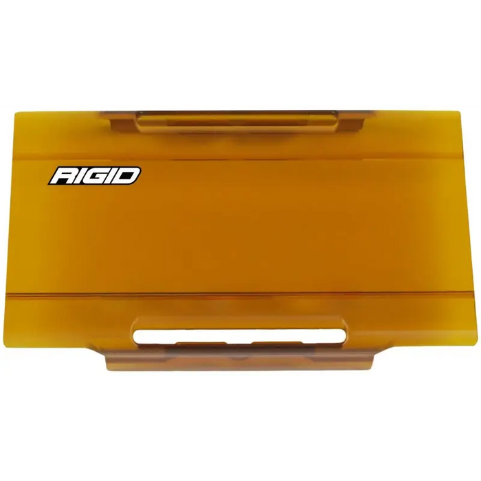 Yellow plastic business card holder displayed in Rigid Industries 6in E-Series light cover.