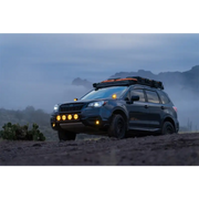 Black SUV driving through a dirt field - Rigid Industries D-SS Spot w/ Amber PRO Lens (Pair)