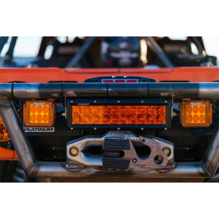 Rigid Industries light cover for D-Series Amber PRO on a red car tail light