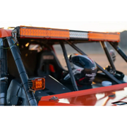 Rigid Industries Protective Polycarbonate Cover - Dually/D2 - Yellow with Front View of Red UTV with Light On