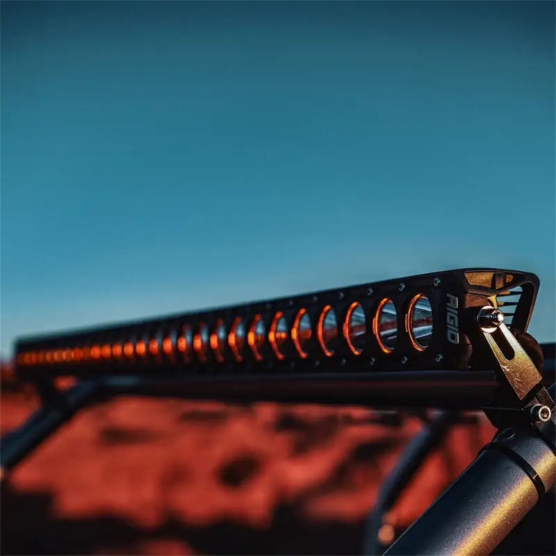 Close up of bike handle on Rigid Industries Revolve 40in Light Bar with Amber Trim Ring