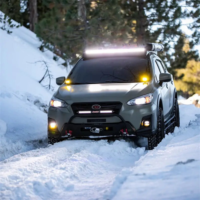 Rigid Industries SR-Series 20in SAE compliant driving light on snowy road