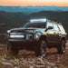 Toyota SUV parked on rocky mountain featuring Rigid RDS SR Series Pro 40in light bar.