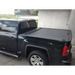 Black truck with Roll-N-Lock truck bed cover for Toyota Tacoma Access Cab/Double Cab LB - 73-11/16in.