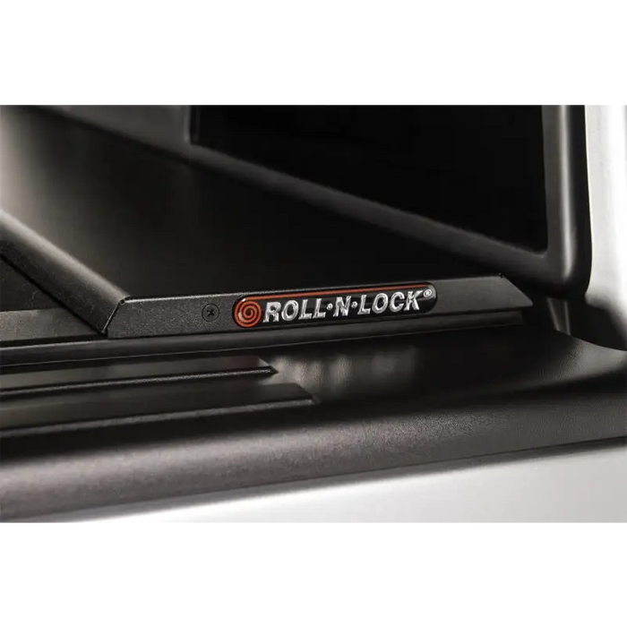 Roll-N-Lock door handle for Ford F-150 truck bed cover.