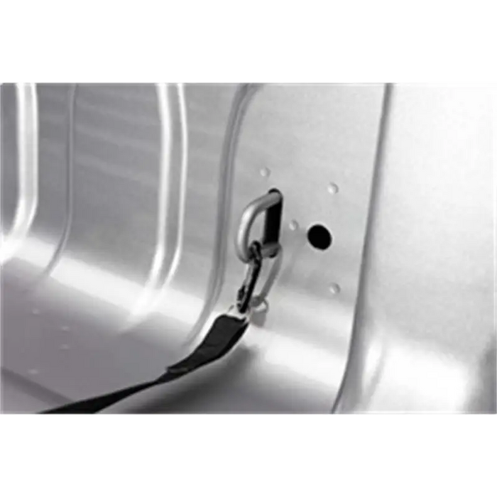 Black and white photo of a door handle on Roll-N-Lock A-Series retractable tonneau cover