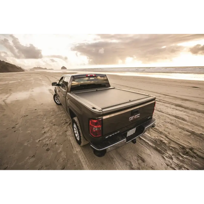 Toyota Tacoma Double Cab SB retractable tonneau cover parked truck on beach