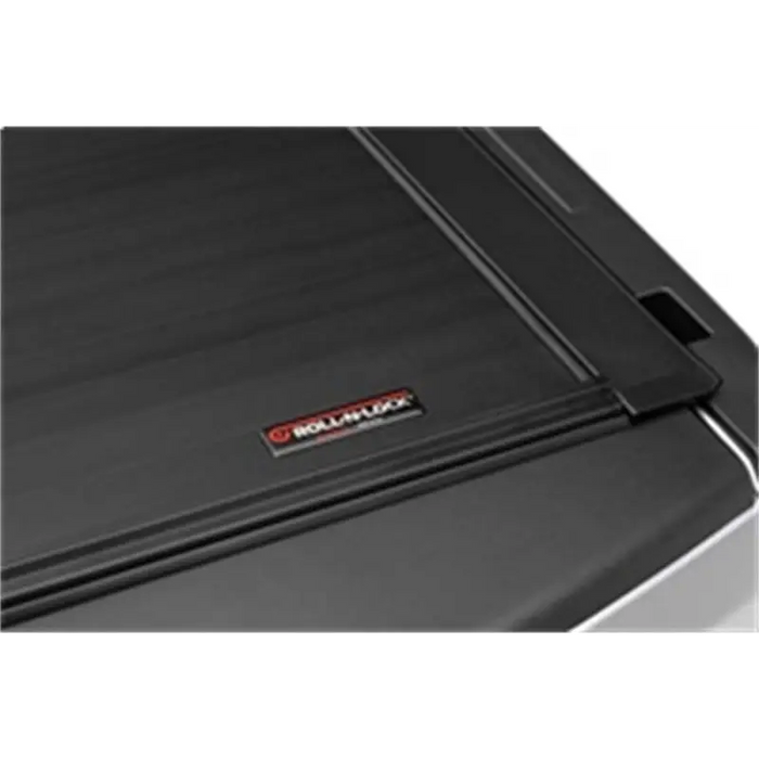 Black roll-on roll-off door on Roll-N-Lock Toyota Tacoma tonneau cover