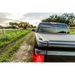 Red light truck with Roll-N-Lock tonneau cover.