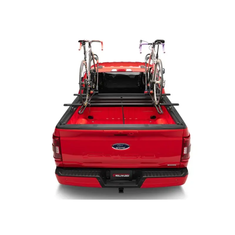 Red pickup truck with bike rack, Roll-N-Lock M-Series XT retractable cover for 20-22 Jeep Gladiator (w/o trail rail sys - 60