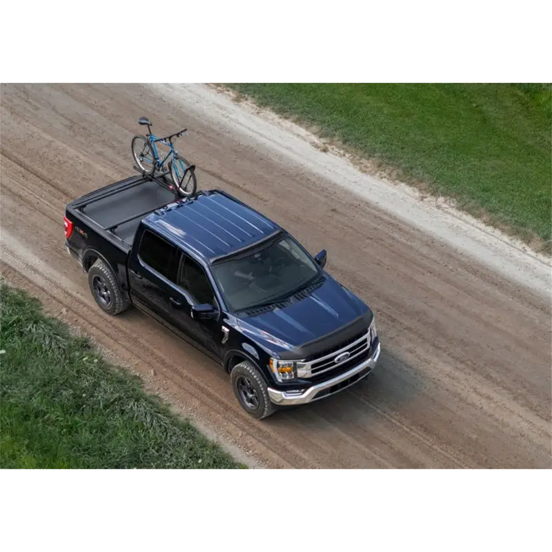 Roll-N-Lock M-Series XT Retractable Cover with bike on truck roof - 60in. Bed