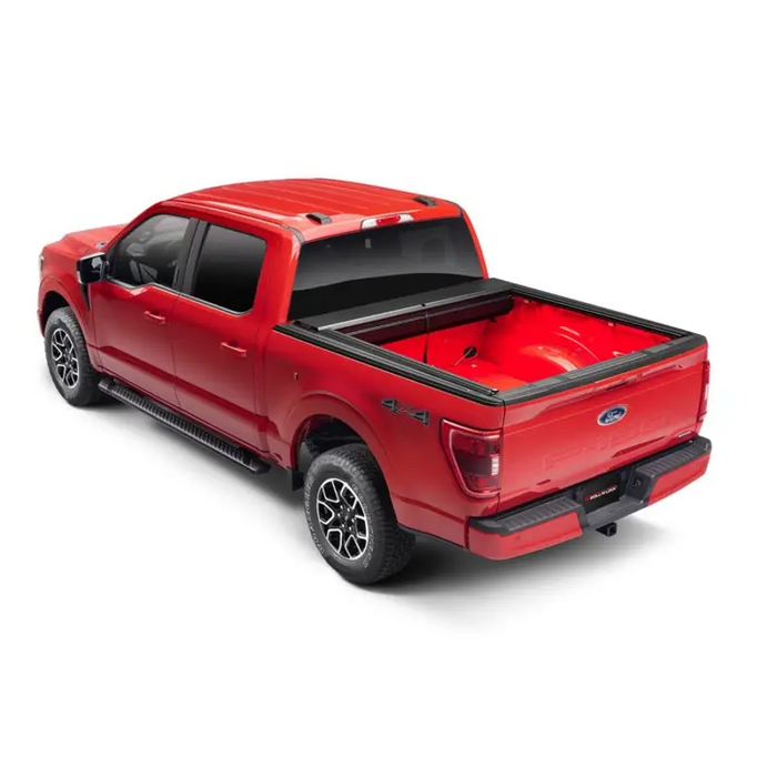 Red truck with black bed cover - Roll-N-Lock Retractable Tonneau Cover for 20-22 Jeep Gladiator with Trail Rail Sys, 60in