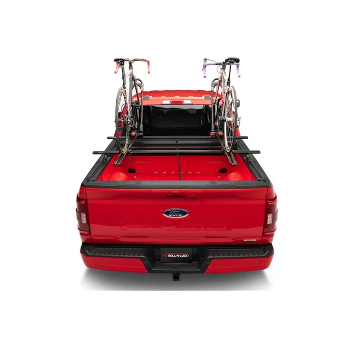 Red pickup truck with bike rack, Roll-N-Lock M-Series XT Tonneau Cover for Jeep Gladiator (w/Trail Rail Sys 60in)