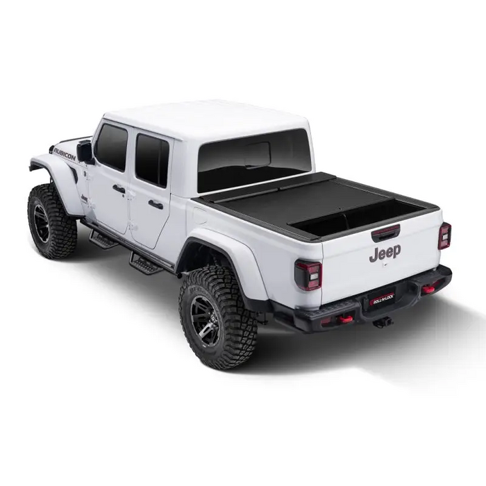 Roll-N-Lock retractable tonneau cover for 2020 Jeep Gladiator 5ft bed - white truck with black bed cover