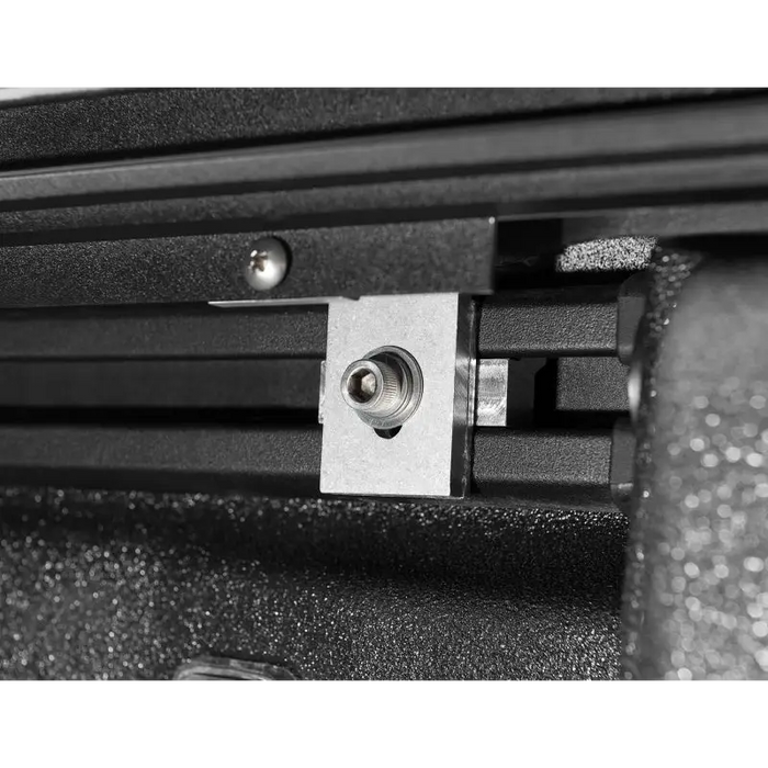 Metal latch attached to Roll-N-Lock truck bed cover on Jeep Gladiator