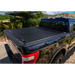 Roll-N-Lock retractable truck bed cover on Jeep Gladiator with black bed cover
