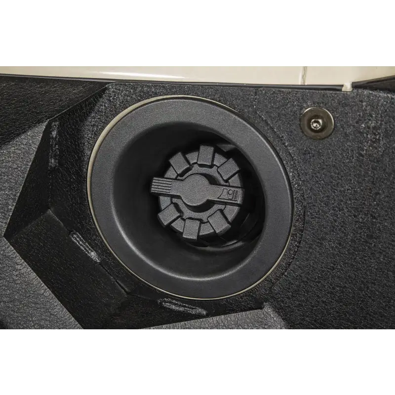 Black Elite Aluminum Fuel Cap for Jeep Wrangler TJ/LJ/JK/JL with a powder coat speaker cover.