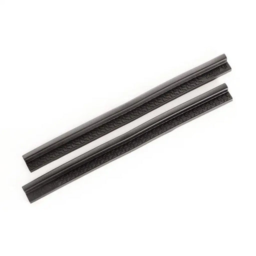 Black plastic straws on white background, entry guards product.