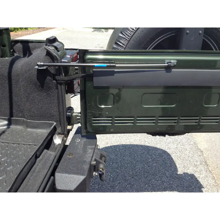 Interior of a truck with door open - Rugged Ridge 07-10 Jeep Wrangler JK Tailgate Assist Kit