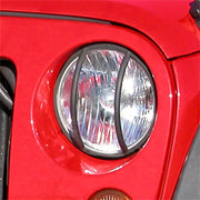 Red motorcycle headlight on Rugged Ridge 07-18 Jeep Wrangler JK Black Headlight Euro Guards