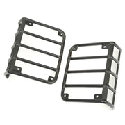 Pair of black plastic front bumpers for the Polarcat shown in Rugged Ridge 07-18 Jeep Wrangler Tail Light Euro Guards.