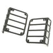 Pair of black plastic front bumpers for the Polarcat shown in Rugged Ridge 07-18 Jeep Wrangler Tail Light Euro Guards.