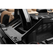 Black leather front seat in Rugged Ridge Wrangler JK/JL 4-Door Interior Storage Rack.