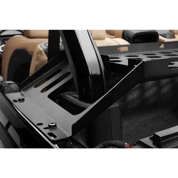 Black leather front seat in Rugged Ridge Wrangler JK/JL 4-Door Interior Storage Rack.