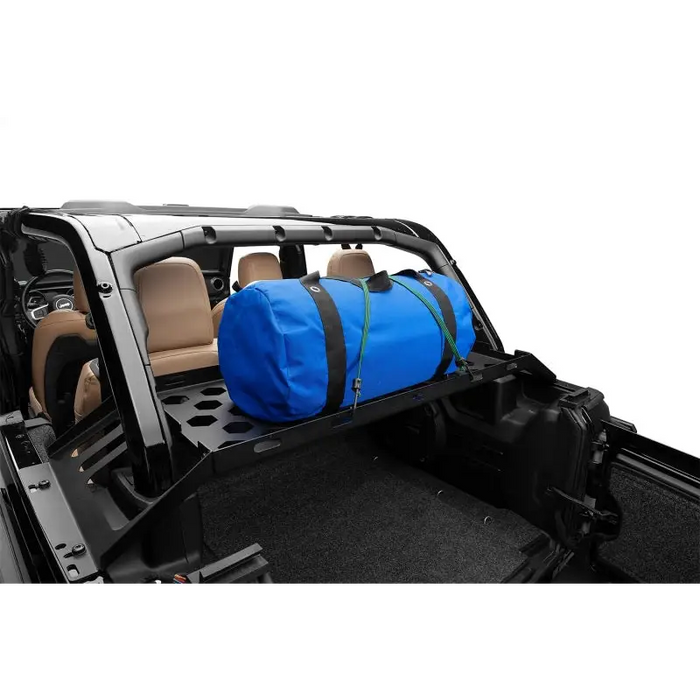 Interior storage rack for Wrangler JK/JL 4-door with blue bag in back seat