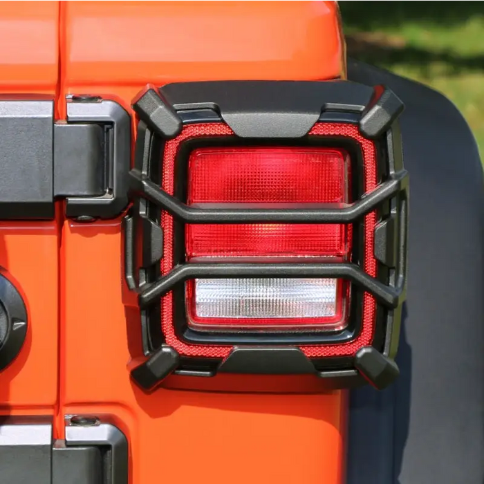 Rugged Ridge 18-20 Jeep Wrangler JL Elite Tail Light Guard with two lights on