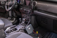 Interior of a car with steering wheel and dashboard, featured in rugged ridge 18-22 jeep wrangler / gladiator race radio mount