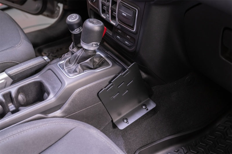 Interior view of jeep wrangler radio mount with steering wheel and cup holder