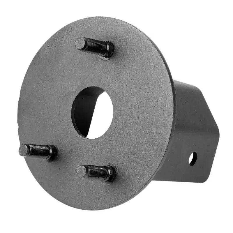 Black metal plate with hole and screws on Rugged Ridge tire carrier.