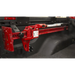 Red truck with black and white bumpers on a Rugged Ridge off-road jack bed rail mount.