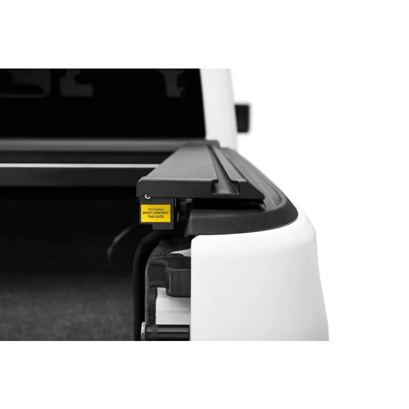 Rugged Ridge 20-22 Jeep Gladiator tonneau cover with yellow label and max track.
