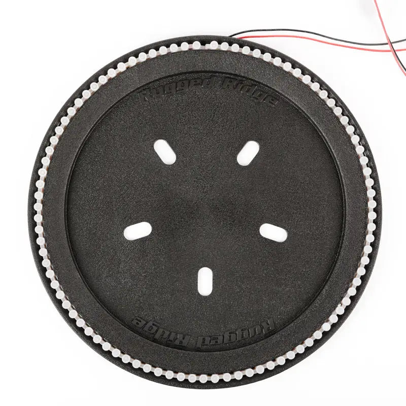 Black plastic button with white dots, featured in Rugged Ridge 3rd Brake Light LED Ring.