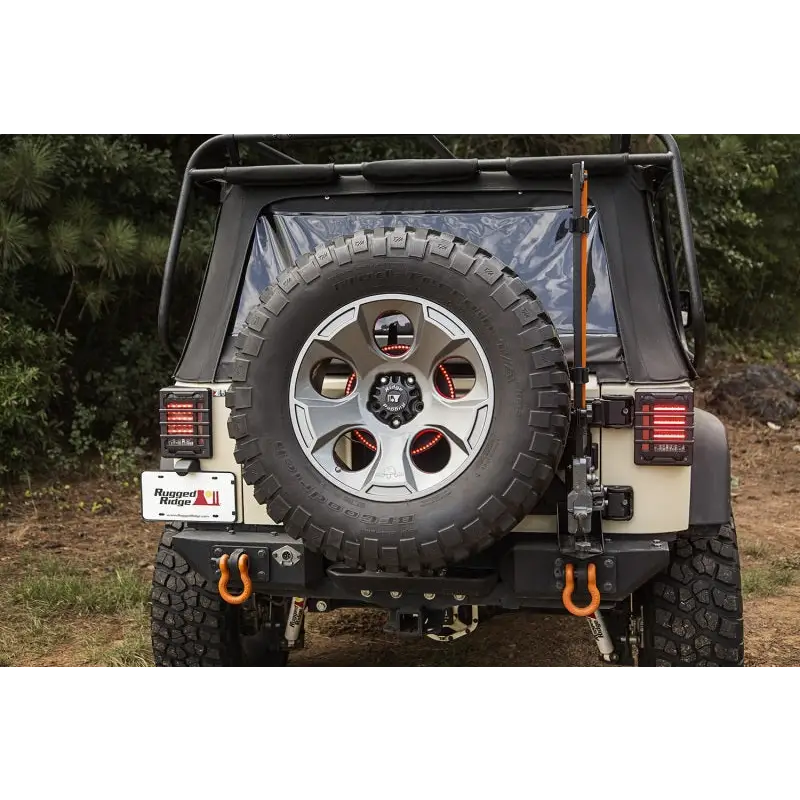 Rugged Ridge 3rd Brake Light LED Ring featuring rear of a jeep with tire cover