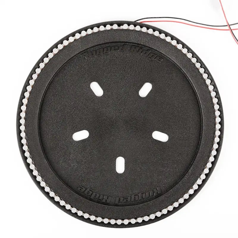 Rugged Ridge 3rd Brake Light LED Ring with black plastic button and white dots.