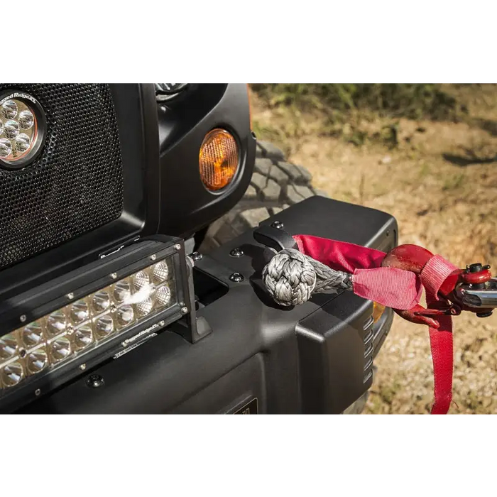 Rugged Ridge soft rope shackle with front light of a Jeep and red ribbon.