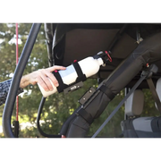 Man holding bottle in hand with Rugged Ridge Jeep Wrangler Elite Fire Extinguisher Holder.