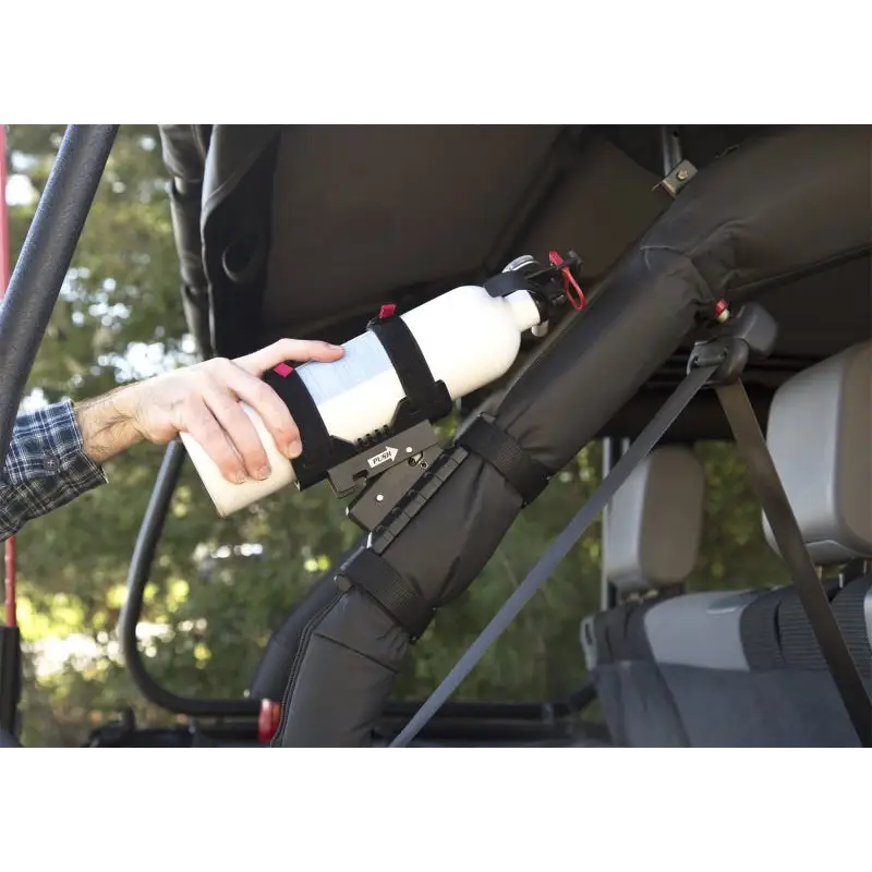 Rugged Ridge Jeep Wrangler fire extinguisher holder installed on a baby stroller.