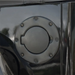 Close up of metal door button on Rugged Ridge Jeep Wrangler gas cap.