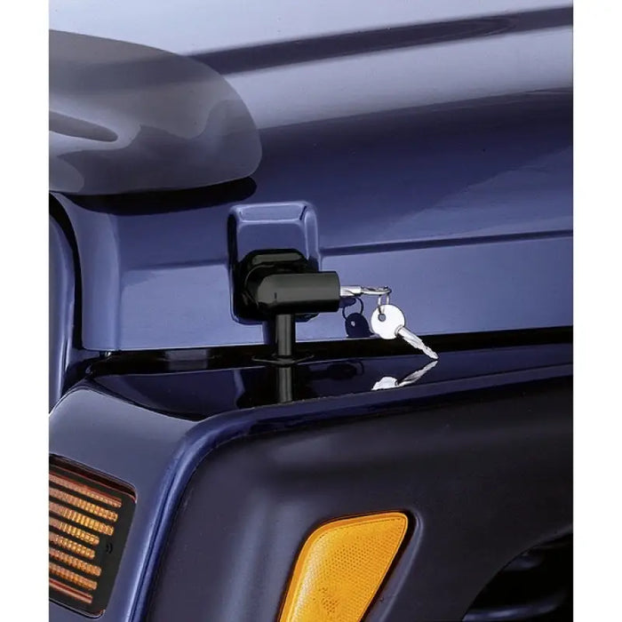 Blue truck front end with Locking Hood Catch Kit by Rugged Ridge.